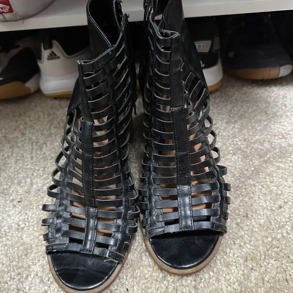 Black Gladiator High-Top Sandals with Intricate Design